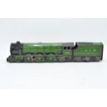 A tin plate model of a locomotive / steam train with tender 'The Flying Scotsman'. Sold as a