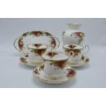 A collection of Royal Albert items in the Old Country Roses design to include 3 breakfast cups and