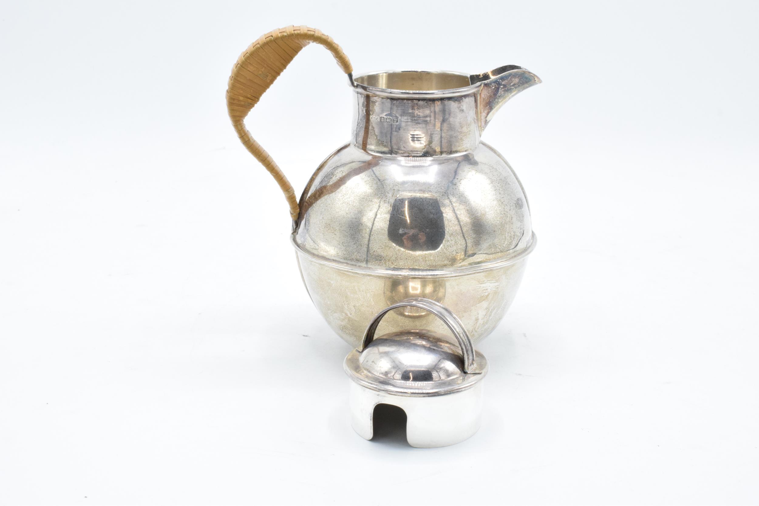 A hallmarked silver Jersey style cream jug with wicker style handle. Gross weight 315.6 grams. - Image 3 of 6