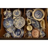 A large collection of 19th and 20th century blue and white pottery to include tea pots, duos,