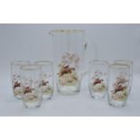A glass water jug together with 6 glasses depicting traditional hunting scenes (7). In good