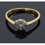 18ct gold daisy ring set with diamonds. UK size O. 2.1 grams. In good condition.
