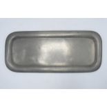 A large Liberty and Co Tudric Pewter rectangular tray with hammered effect. 51 x 22cm.