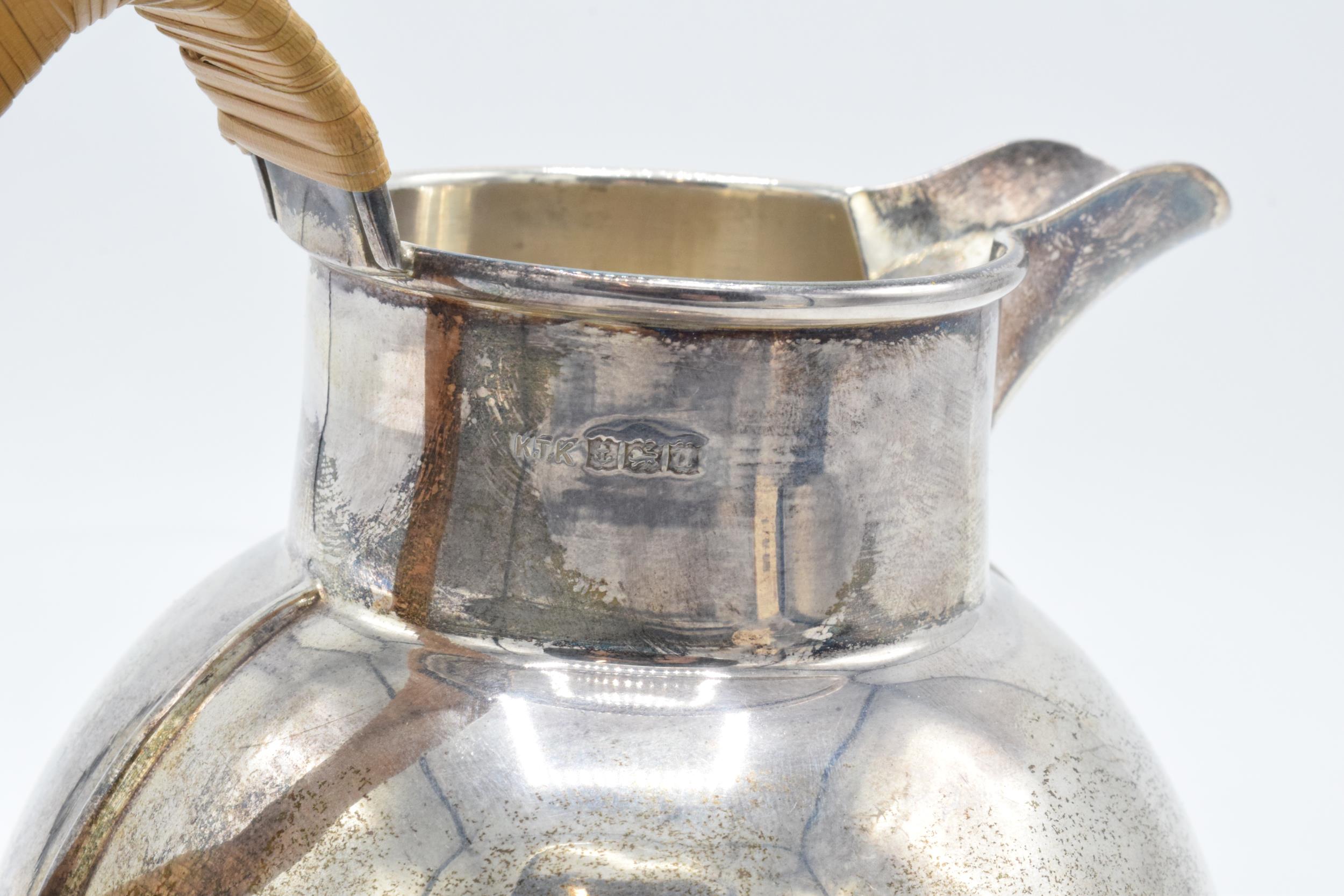 A hallmarked silver Jersey style cream jug with wicker style handle. Gross weight 315.6 grams. - Image 5 of 6