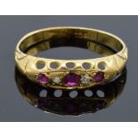 Edwardian 18ct gold ruby and diamond ring. UK size J/K. 1.8 grams.