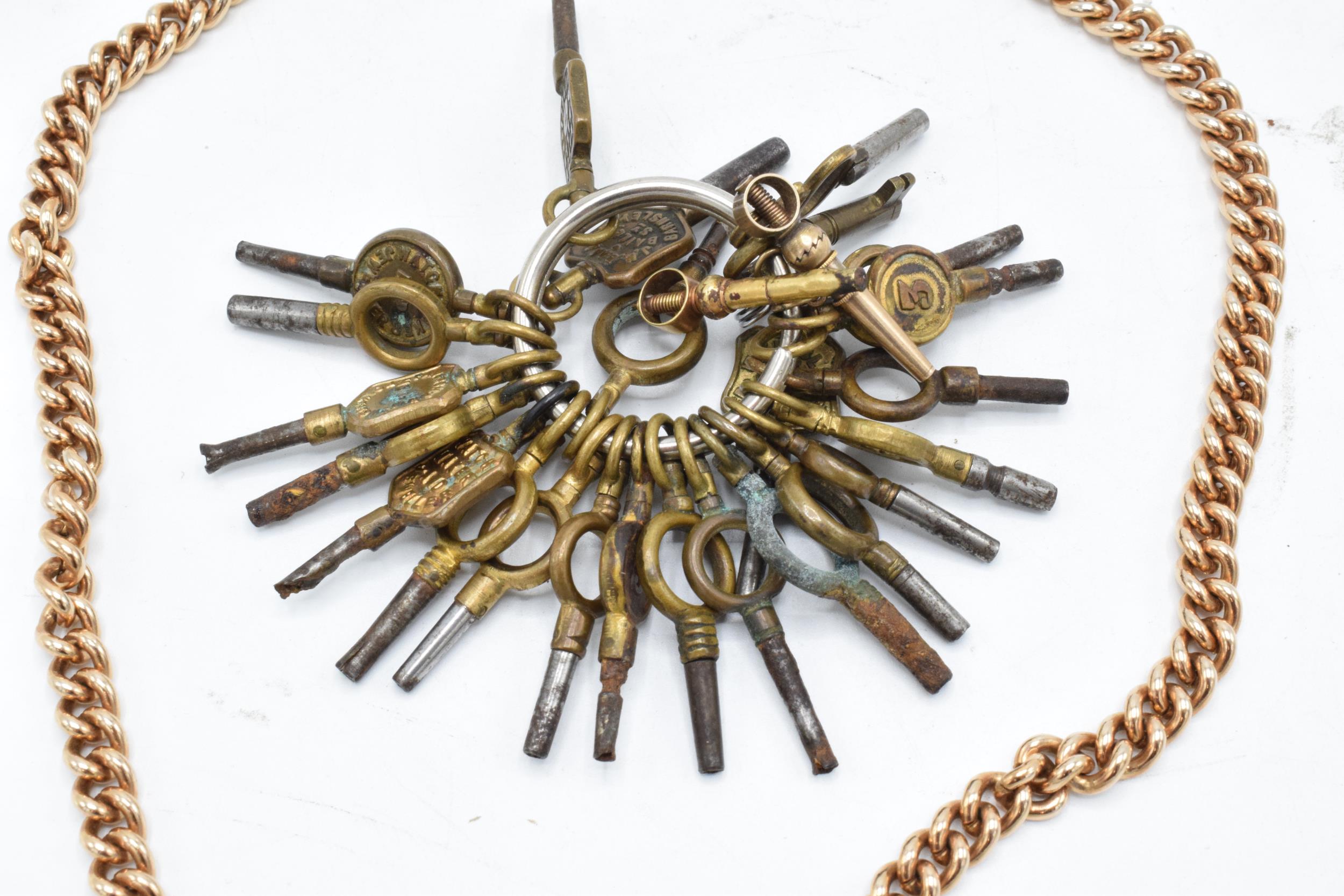 A good collection of pocket watch keys to include advertising examples such as W Kibble,