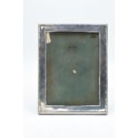 A silver picture frame (Birmingham 1919). In good condition with no obvious damage or restoration.