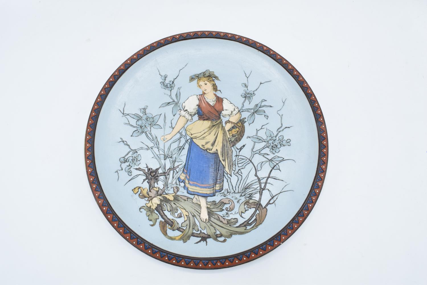 Late 19th century Mettlach (Villeroy and Boch) wall charger after C. Warth decorated with a lady