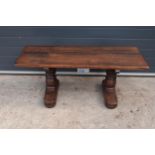 A stained thick pine coffee / side table. 124 x 49 x 51. In good functional condition with signs