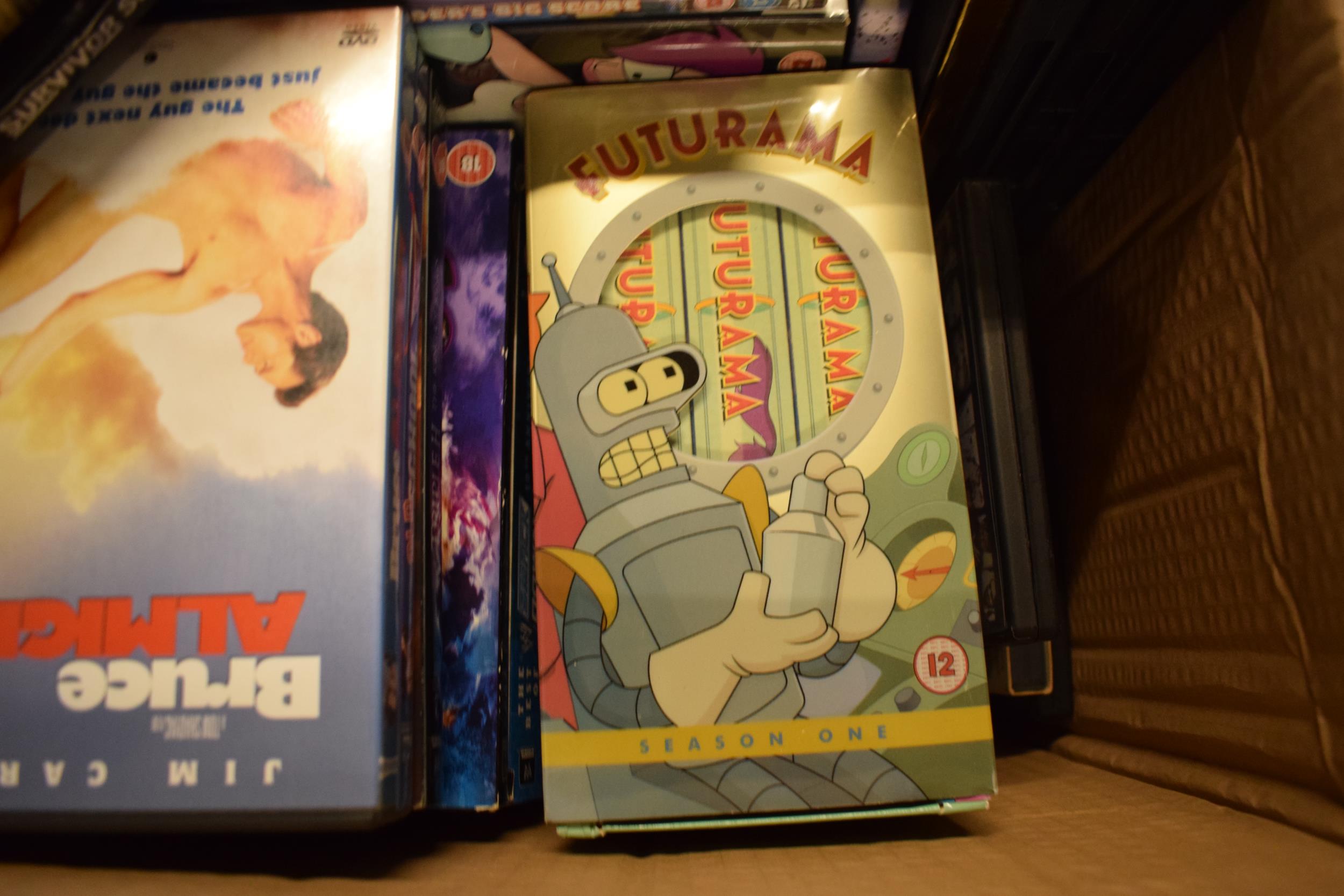 A large collection of DVDs and related items to include Futurama box sets, Bruce Almighty, Boat Trip - Image 2 of 2