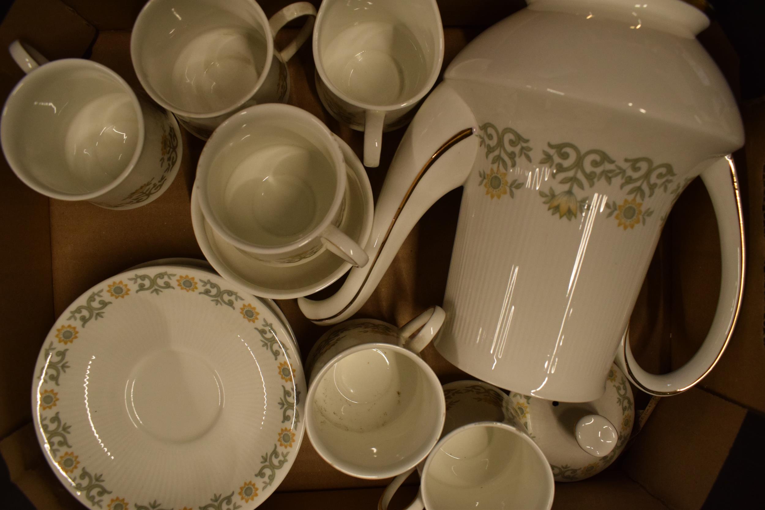 A collection of Paragon tea ware in the 'Fiona' pattern to include a coffee pot, 5 cups, 6 saucers