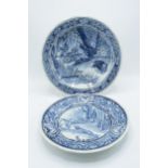 A pair of Delfts blue and white wall chargers depicting country and hunting scenes. 'Made for