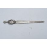 A silver Maltese letter opener with an inset silver Italian coin. 24cm long. 50.5 grams.