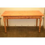 A 20th century pine kitchen table. 152 x 70 x 78cm tall. In good functional condition with signs