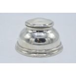 Large hallmarked silver inkwell with hinged lid. Birmingham 1927. 12cm widest diameter. No liner.