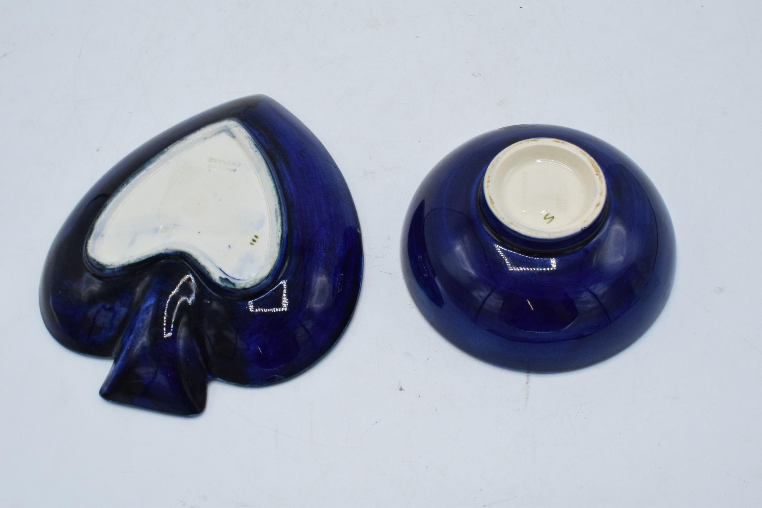 A pair of Moorcroft items to include a hibiscus on blue spade-shaped ashtray together with a similar - Image 2 of 3