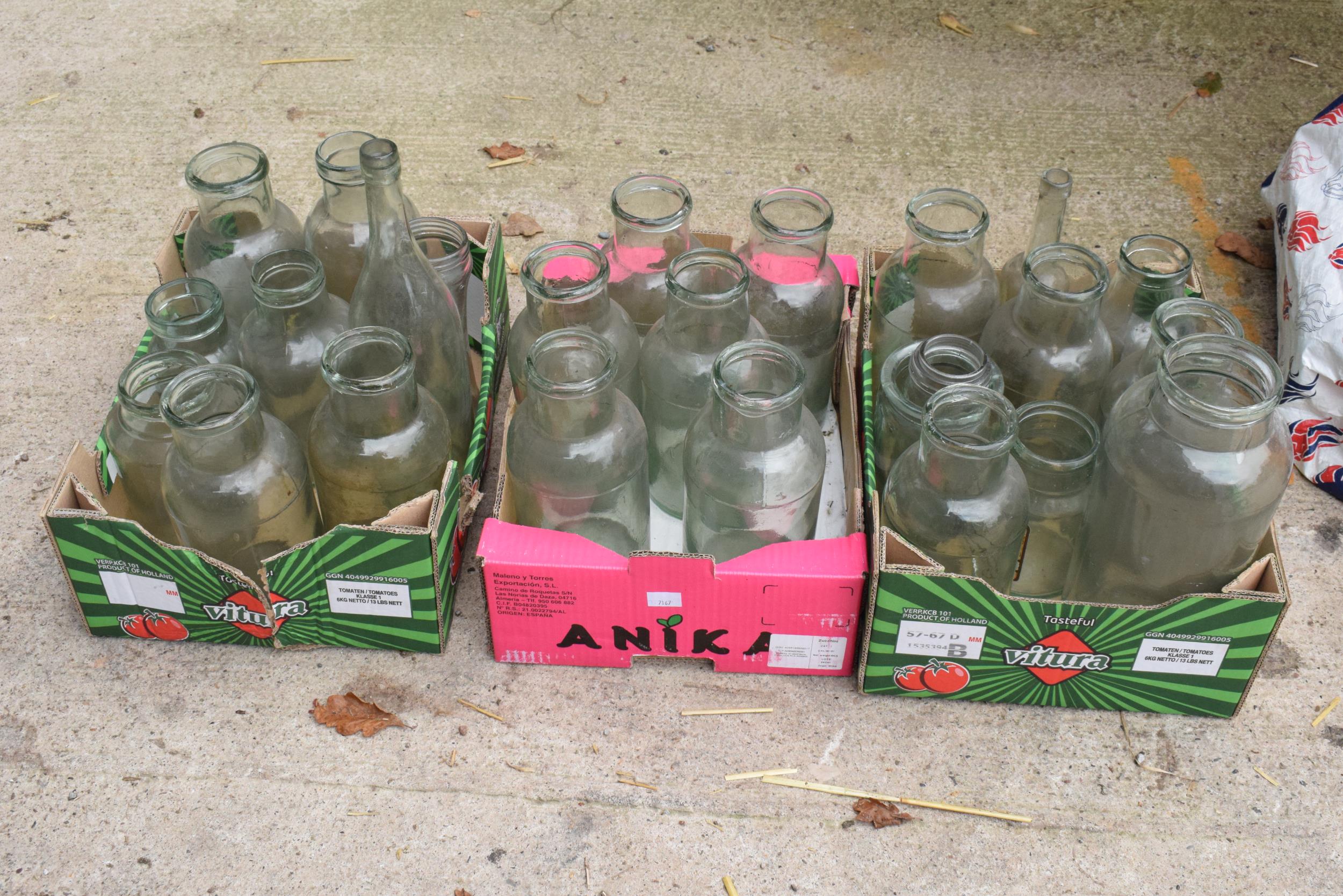 A large collection of glass items to include bottles, jars etc (approx 25) NO POSTAGE