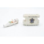 A pair of Crested China items to include a Willow Art Kewpie with Warkworth crest together with a