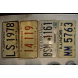 A collection of vintage American car number plates (4)