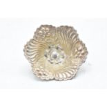 A continental silver bon bon dish raised on three legs. 64.7 grams. 12cm diameter.