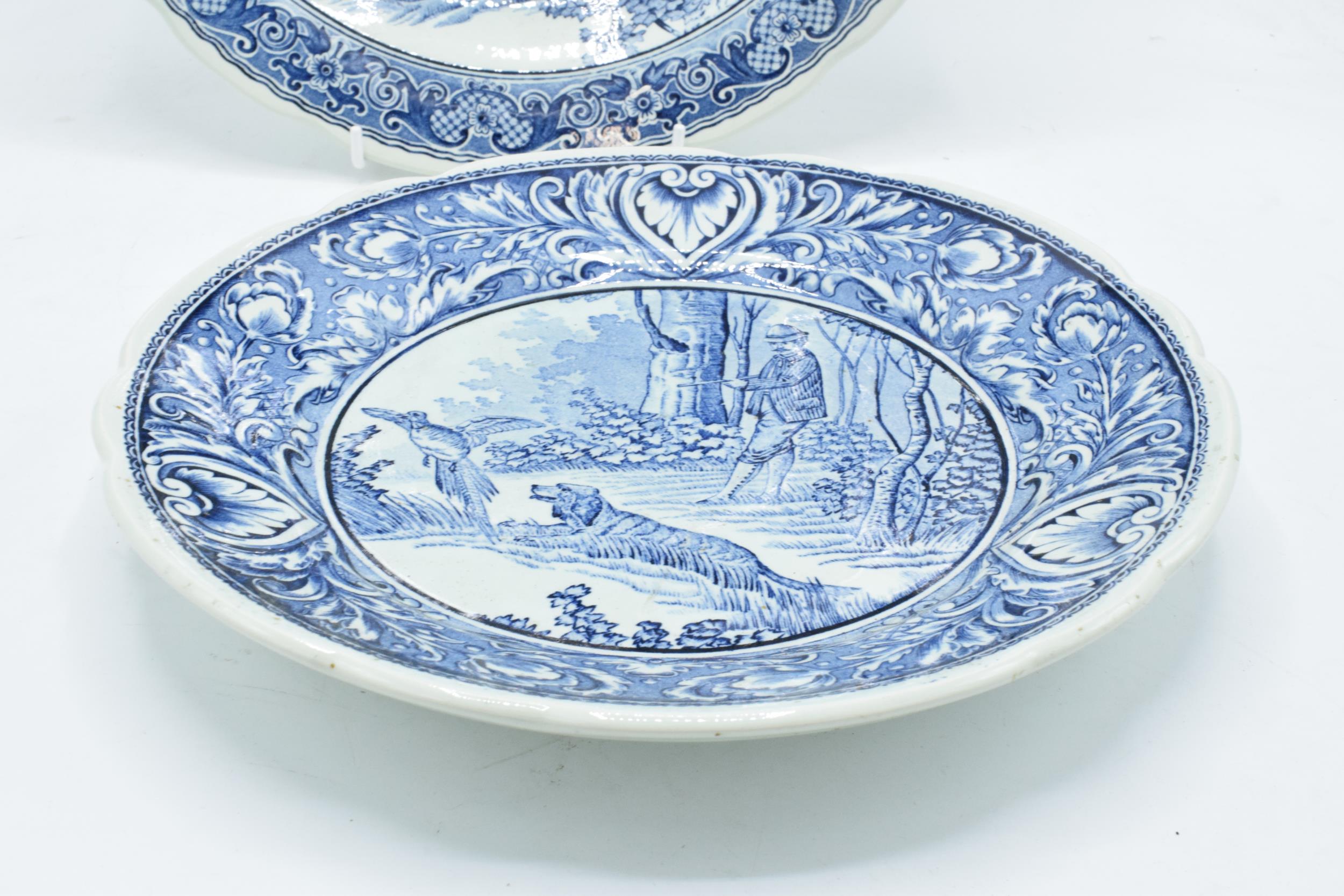 A pair of Delfts blue and white wall chargers depicting country and hunting scenes. 'Made for - Image 3 of 4
