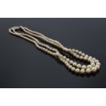 A double string imitation pearl necklace set with a white 9ct gold clasp.