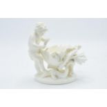 Moore Bros cherub dish with shaped edges and a floral design 15.5cm tall. 'MOORE' impressed to base.