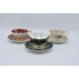 A collection of cups and saucers / duos to include Aysnley and Paragon depicting regal style