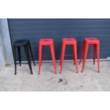 A collection of industrial style metal stacking stools (4). 76cm tall. In good functional