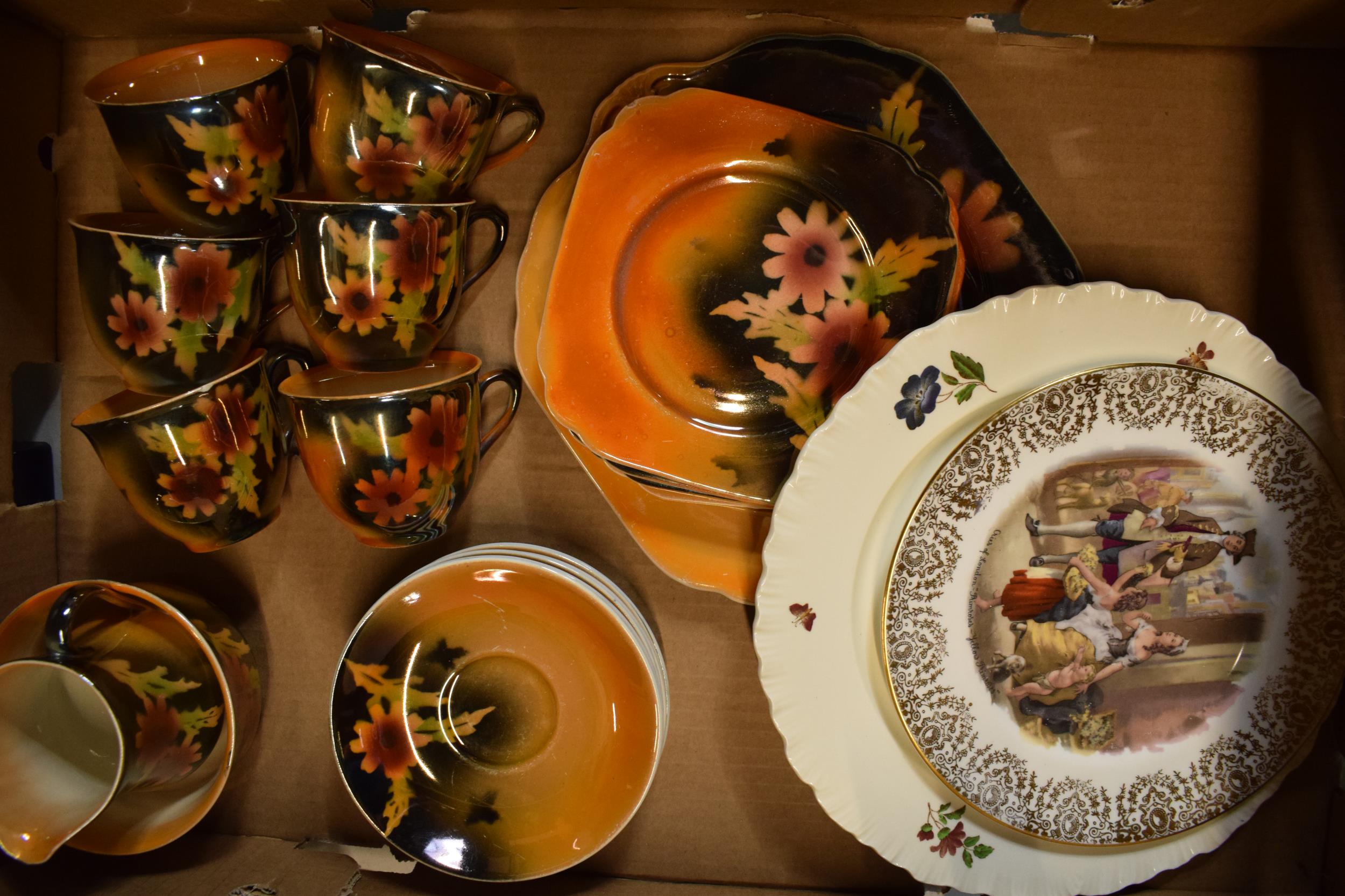 A collection of Empire Ware orange lustre tea set decorated with a floral design to include 6