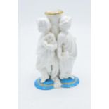 Late 19th century Continental porcelain candlestick or similar item depicting cherubs wearing