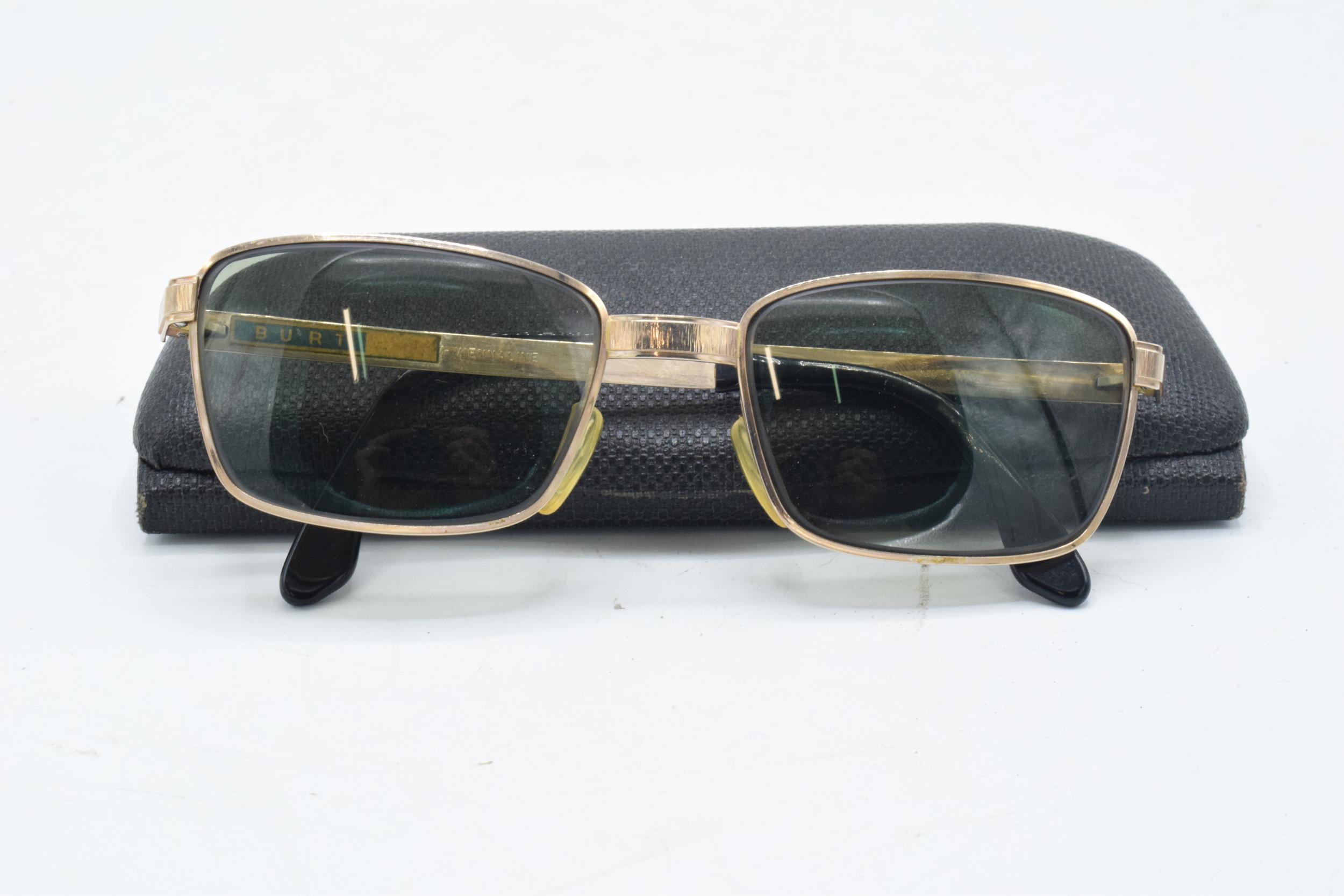 A pair of Viennaline gold plated vintage sunglasses fitted with prescription lenses in case.