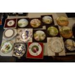 A collection of plates to include various scenes including Royal Doulton seriesware, commemorative