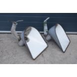 A near pair of large 20th century industrial style light hoods, potentially street / factory