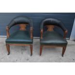 A pair of 19th century upholstered Captain's Bow or similar smokers / library chairs. In good