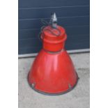 A large 20th century metal industrial hanging light in a red colourway. 72cm tall. Untested.