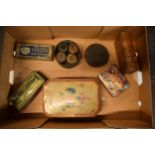 A collection of vintage tins and a fake book money box together with a tin of spices to include