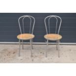 A pair of retro / vintage aluminium American Diner style chairs (87cm tall) together with a Lloyd