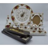 A collection of Royal Albert Old Country Roses items to include a photo frame, clock plate,
