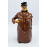 Royal Doulton Kingsware whisky decanter in the form of a Coachman with a silver plated rim. In