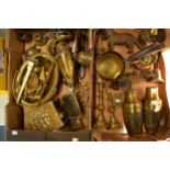 A good collection of brass and metalware to include nut crackers, vases, saucepans, trivet, boxes,