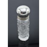 Victorian glass scent bottle with silver screw top lid. Birmingham 1901. 8cm tall. In good