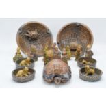 A collection of Wade items to include bowls with tortoises, dogs in their baskets and nursery