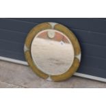 A large late 19th / early 20th century Arts and Crafts hammered brass circular wall mirror. Approx