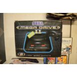 A collection of Sega items to include Sega Master System II, Mega Drive II and games to include