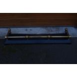 A Victorian brass and metal fire fender. 130 x 32cm.