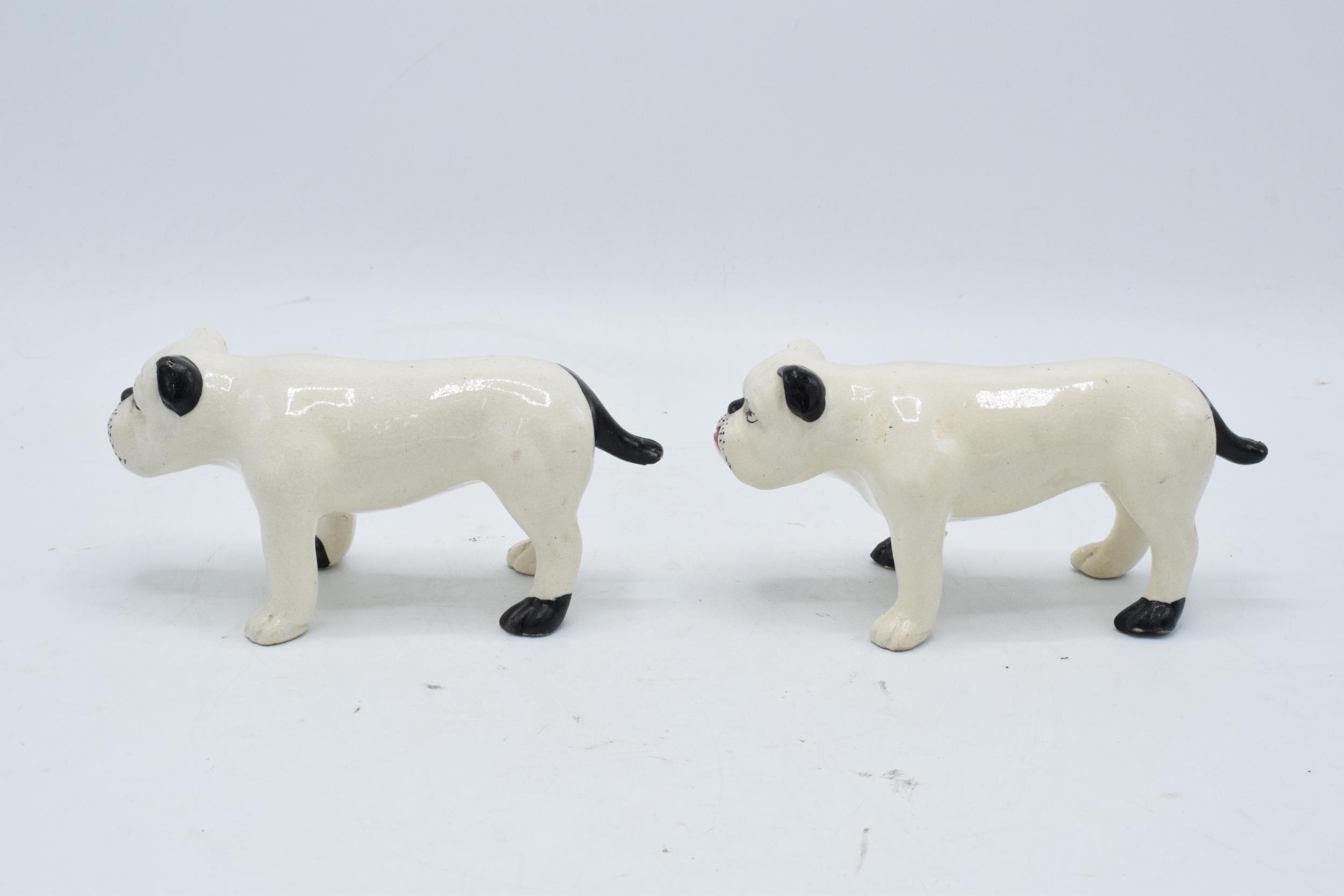 A pair of 19th century pottery bulldogs standing square (2). In good condition with no obvious - Image 2 of 4