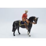 Beswick Canadian Mountie 1375. 21cm tall. In good condition generally though restoration is