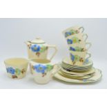 A collection of Empire Shelton Ivory in Art Deco style to consist of 4 cups, 6 saucers, 4 sides,