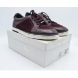 A pair of Jimmy Choo Miami burgundy suede and patent leather men's trainers, with a think sole,